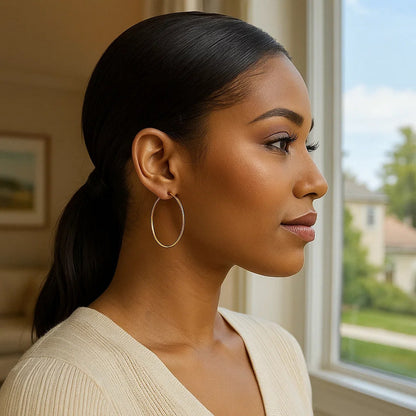 Nicholanti Collection 10k Yellow Gold Polished Hoop Earrings (1.5x40 mm) - angled side view showing craftsmanship