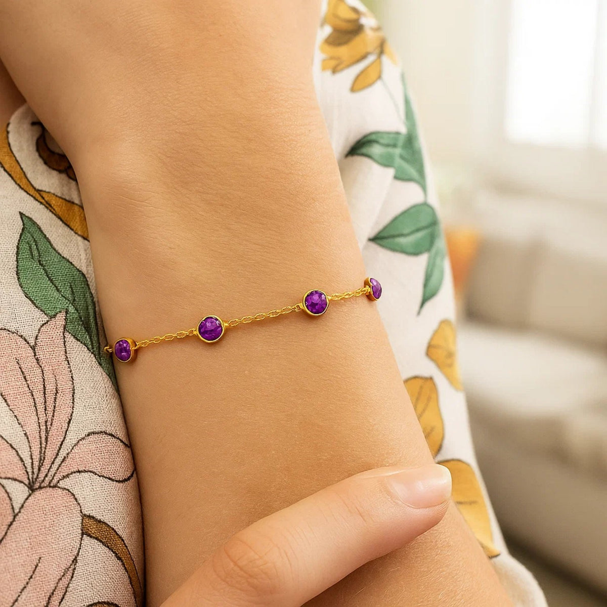 Nicholanti Collection 14k Yellow Gold Pink Sapphire Station Bracelet with Open Cable Chain - worn on wrist lifestyle view