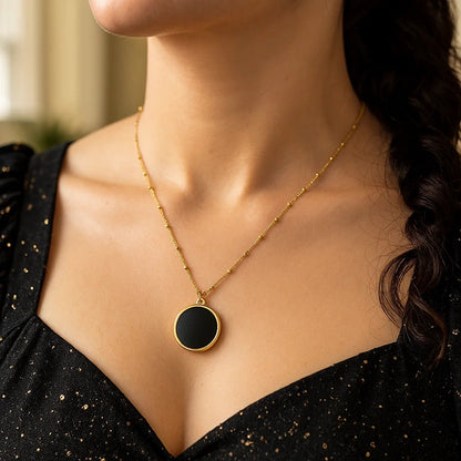 Nicholanti Collection 14k Yellow Gold Onyx Inlay Circle Necklace - worn by model on neckline
