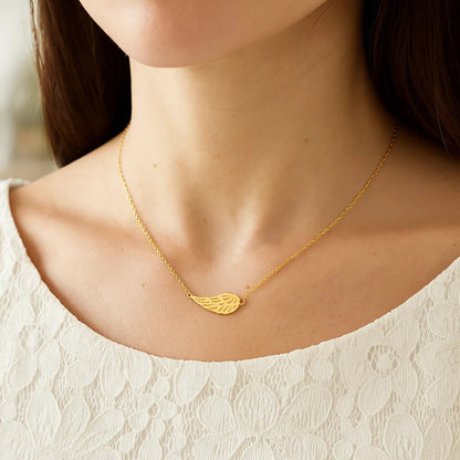 Nicholanti Collection 14k Yellow Gold Angel Wing Necklace - angled side view showing craftsmanship
